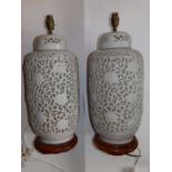 A pair of 20thC Chinese reticulated vase lamps, 16”.