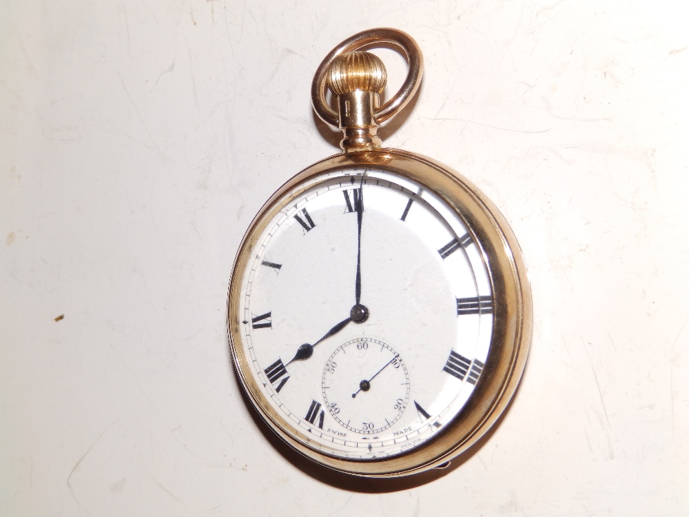 A 9ct gold open faced pocket watch with white enamel dial having subsidiary seconds – '15 jewels