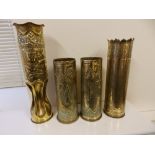 A pair of German trench art shell cases – 'Marne' , a French waisted trench art case and one