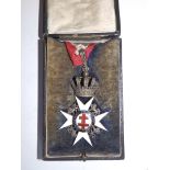 An enamelled silver Knights Templar medal presented to Sir Kt. G. W. Atcheson PP from Preceptory