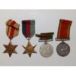 A WWII medal group awarded to E. McEwan, comprising; Africa Service Medal, Africa & 39-45 Stars