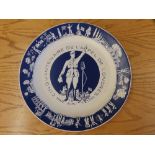 A 1990 De Gaulle commemorative plate, two French soldier figures, a German Kaiser figure, a 1917