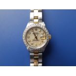 A lady's diamond set bi-metal Rolex Oyster Perpetual Datejust wrist watch, having after-market