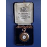 A cased 9ct gold half hunter Benson pocket watch with 14” chain, the white enamel dial with