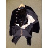 A 19thC naval uniform with cut steel buttons and bicorn hat.