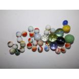 A small collection of old marbles.