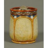 A Royal Doulton tobacco jar, Patent No. 194168. Height 14.5 cm. CONDITION REPORT: The lid has four