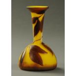 An Emile Galle vase, brown overlaid to yellow ground and signed "Galle". Height 10.5 cm. CONDITION