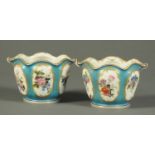 A pair of 19th century cache pots, in the Sevres style, polychrome. Height 11 cm. CONDITION