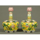 A pair of 19th century Chinese Famille Jaune tulip vases, each with six apertures. Height 25 cm (see