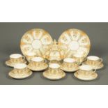 A Victorian part tea set, white, cream and gilt, comprising lidded sucrier, 2 plates, 9 cups and 7