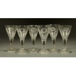 A set of six engraved wine glasses, late 18th/early 19th century.  Height 11 cm.