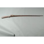 Matchlock gun with 51 inch barrel, barrel stamped "82-21". Length 70 ins. No Serial No.