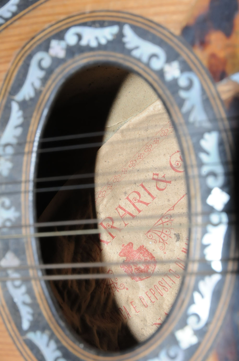 A mandolin by Ferrari & Co., rosewood and mother of pearl inlaid. - Image 3 of 3