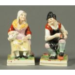 A pair of 19th century Staffordshire figures, cobbler and maid. Height 15 cm.