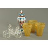 Three yellow tinted moulded glass light shades, a pair of enamelled glass globular squat vases,