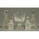 A 19th century cut glass goblet, with lemon squeezer base, and two pairs of glass scent bottles.