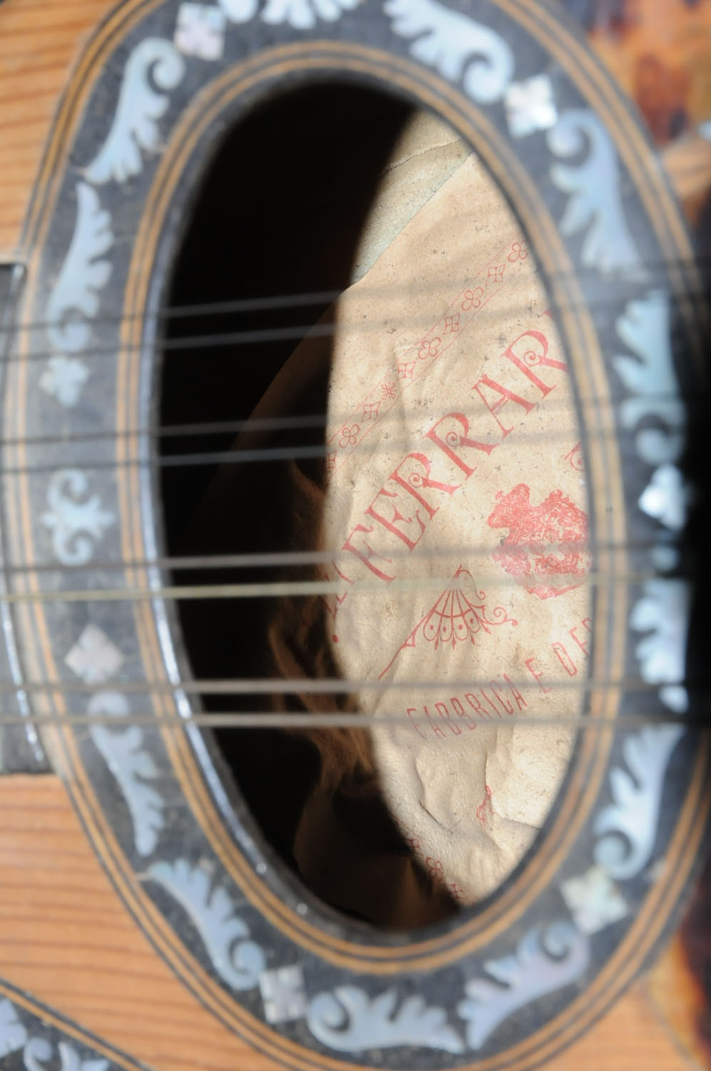 A mandolin by Ferrari & Co., rosewood and mother of pearl inlaid. - Image 2 of 3