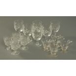 Two sets of four custard glasses, and six white wine crystal glasses.