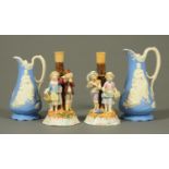 A pair of Continental porcelain figural candlesticks, polychrome, Height 25 cm,