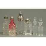 A pair of crystal perfume bottles, height 12 cm, a sifter,