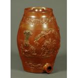 A Victorian stoneware rum barrel, relief moulded with fruiting vine decoration and coat of arms.