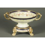 A Noritake bowl on stand, decorated with floral sprays and gilding. Diameter 24 cm.