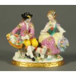 A porcelain figure group, probably Samsons of Paris, male and female figure with lamb,