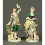 A pair of Samsons of Paris polychrome figurines, each bearing faux gold anchor mark. Height 27 cm.