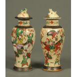 A pair of late 19th/early 20th century Chinese Famille Verte lidded vases,