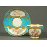 A French porcelain cabinet cup and saucer, with blue ground and decorated with panels of cherubs.