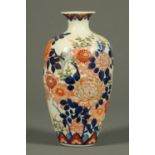 A Japanese Imari vase, decorated in typical Imari colours and with script marks to base. Height 26.