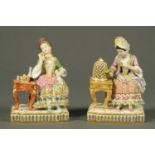 A pair of French porcelain figurines, each of a female figure sat at a table, polychrome.