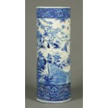 A Chinese blue and white stick stand, decorated with birds and foliage. Height 60 cm.