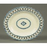 A late 18th/early 19th century Pearl Ware oval plate, with pierced border and basket weave centre.