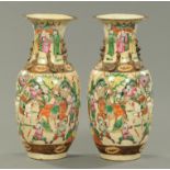 A pair of late 19th century Chinese figural vases, polychrome. Height 45.5 cm (see illustration).