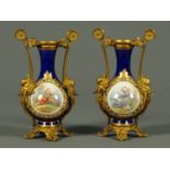 A pair of 19th century French porcelain vases, ormolu mounted,