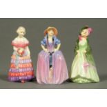 Three Royal Doulton figurines, "Patricia", "The Paisley Shawl" M26 and "Bridesmaid" H30.