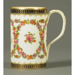 A large Worcester mug, polychrome and heightened with gilding, with hatched mark to base.