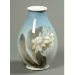 A Royal Copenhagen vase, decorated with a floral spray. Height 30 cm.