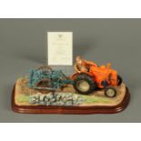 A Border Fine Arts 111A tractor and harrow, with certificate and box.