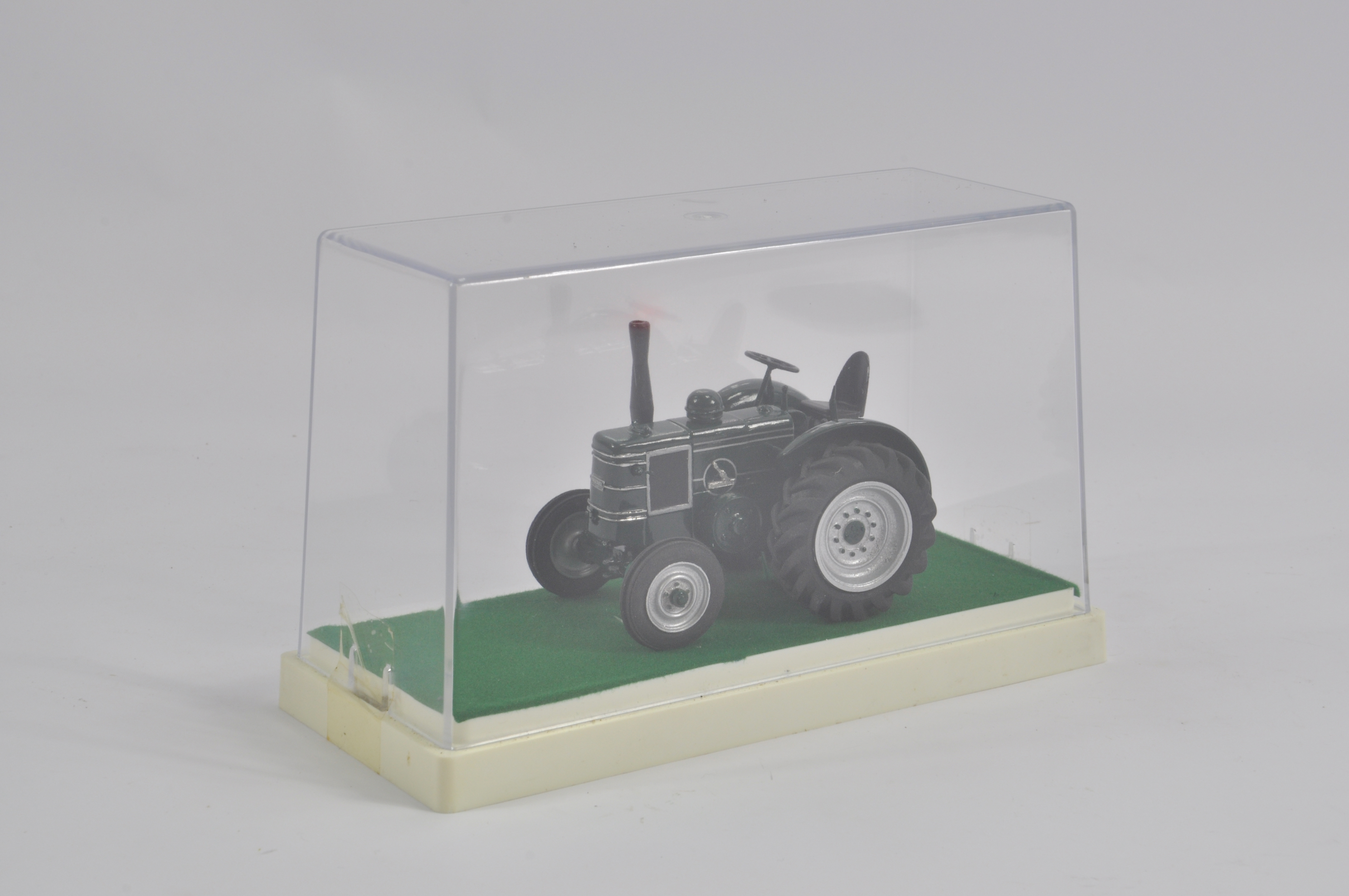 Finely built model in 1/32 scale of a Field Marshall Tractor. NM to M.