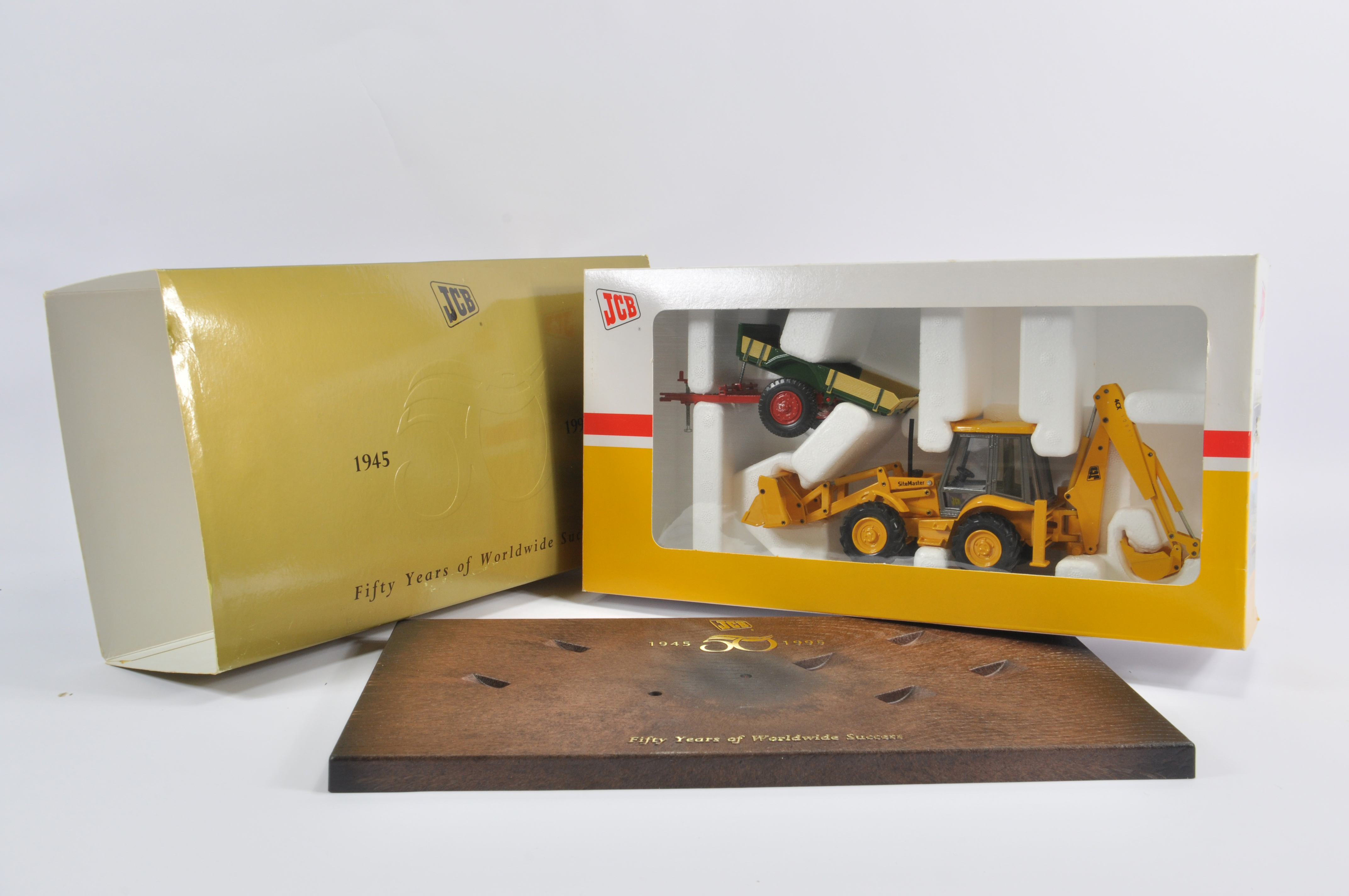 Joal 1/50 50 Years of JCB Gift Set including Sitemaster Backhoe and Trailer. M in E Box.