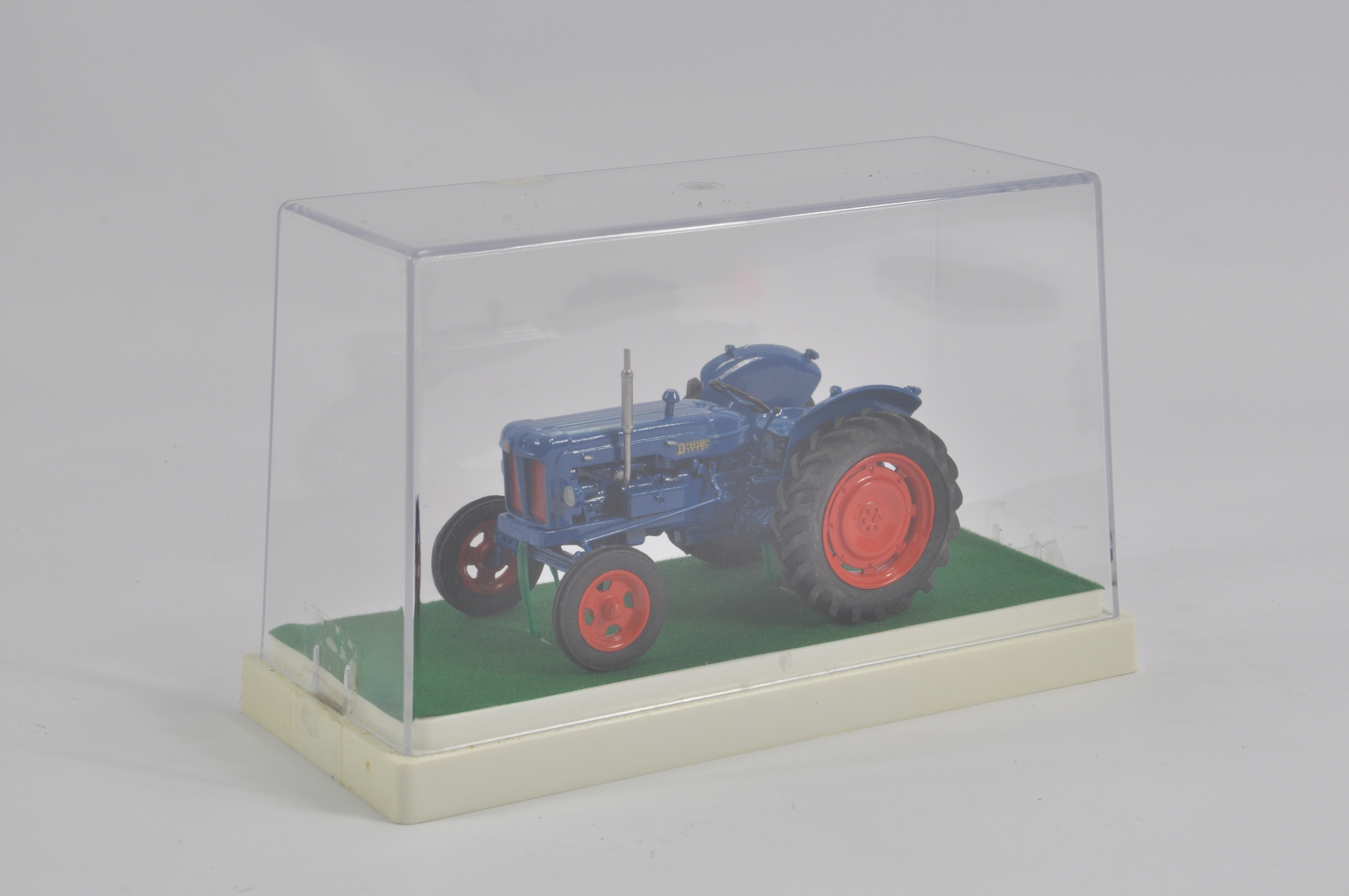 Finely built model in 1/32 scale of a 1953 Fordson Major Diesel Tractor. NM to M.