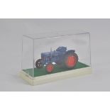 Finely built model in 1/32 scale of a 1953 Fordson Major Diesel Tractor. NM to M.