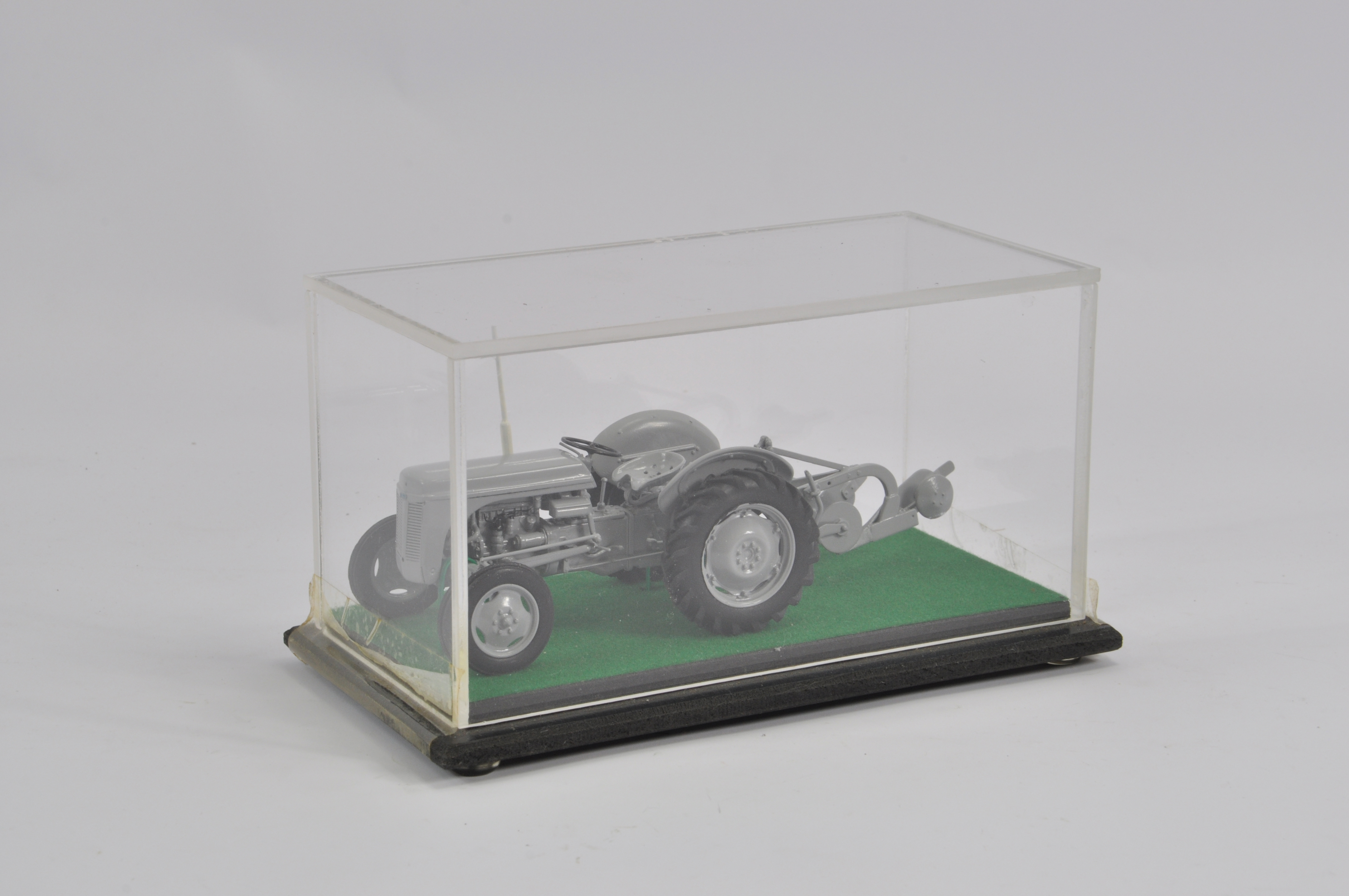 Finely built model in 1/32 scale of a Ferguson TE20 Tractor with Ferguson Plough. NM to M.