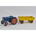 Empire Made Fordson Major Tractor with Scarce Yellow Trailer. Generally F to VG.