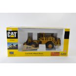 Norscot 1/50 CAT 854G Wheel Dozer. M in E Box.