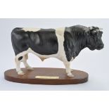 Beswick Model No. A2580 Freisian Bull on wooden plinth. Satin Matt Finish. 7.5". (NM-M)