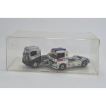 Duo of Diecast Racing Trucks. E to NM in Display Case (2)